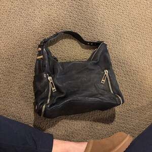 Botkier Black Pebbled Leather Hobo Bag with Gold Zipper Detail